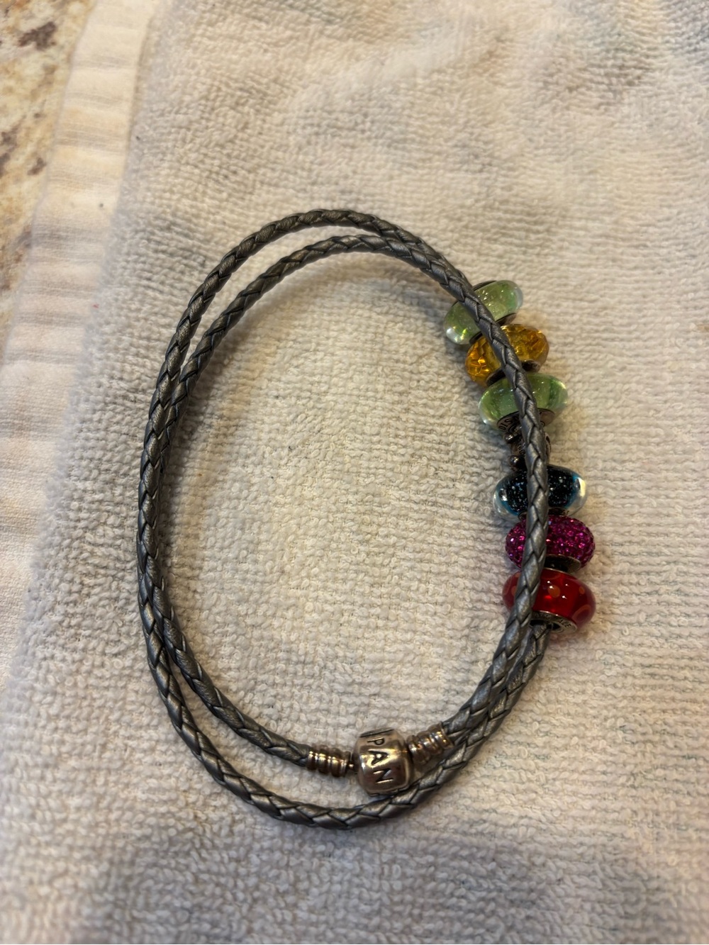Pandora braided wrap leather bracelet.  Glass beads (not Pandora) included.